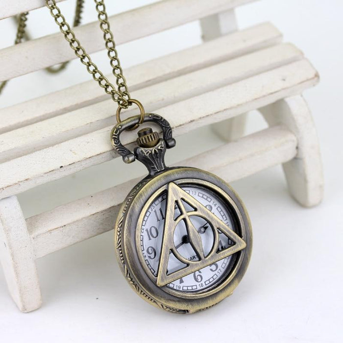 Harry Potter Deathly Hallows Snitch Ball Pocket Watch. - Adilsons