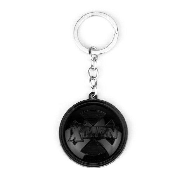 X-Men logo keychains. - Adilsons